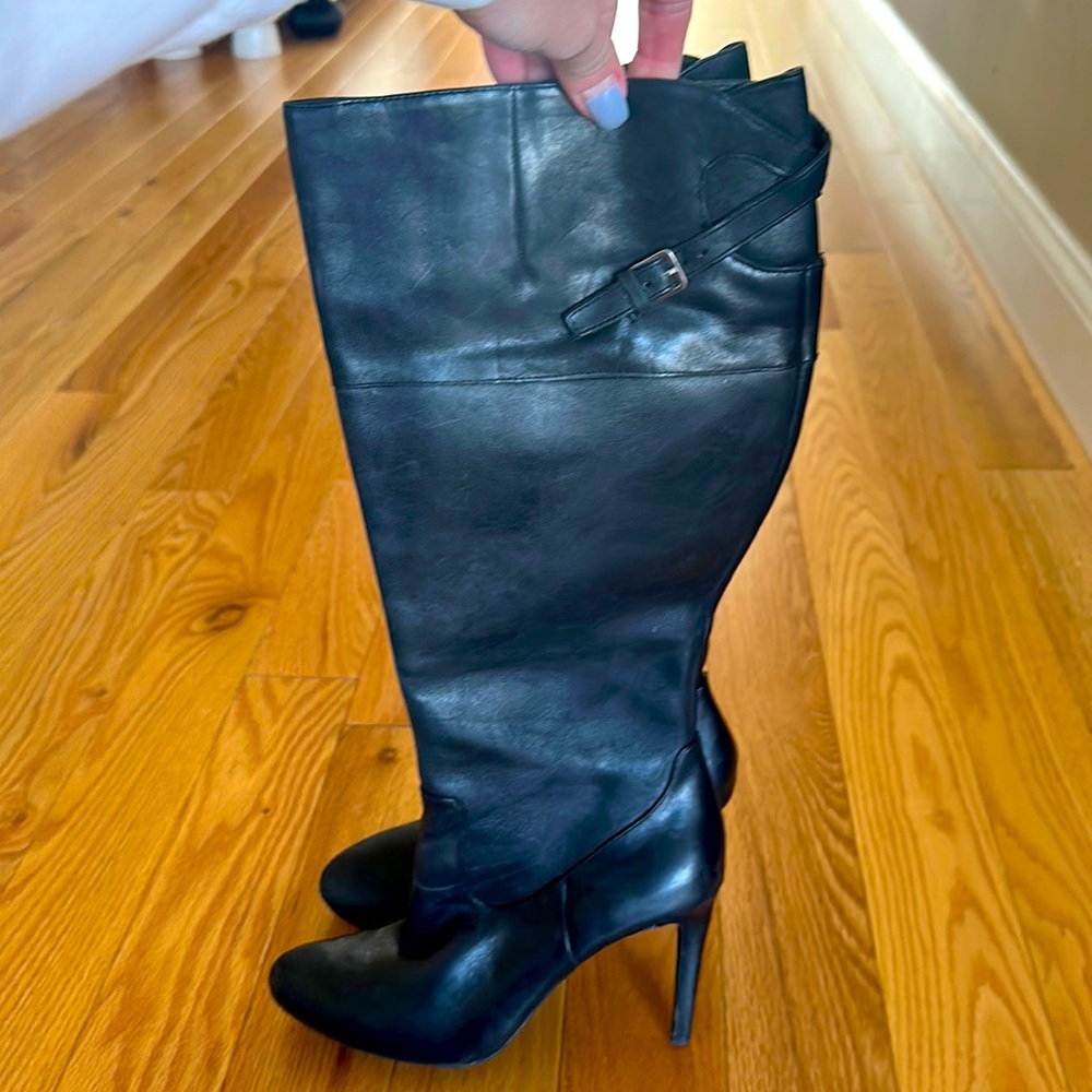 7.5 Black leather Ralph Lauren high heeled boots.
